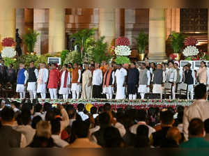 India’s newly sworn-in Prime Minister Narendra Modi (L) with other newly appointed Council of Ministers attends the oath-taking ceremony at presidential palace Rashtrapati Bhavan in New Delhi on June 9, 2024.