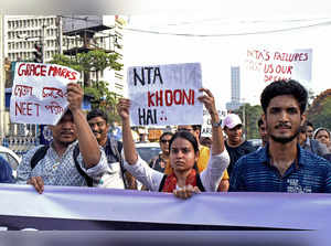 Students stage a protest against the alleged irregularit...