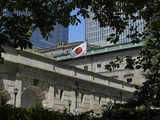 Bank of Japan to trim bond buying, keeps rates steady
