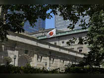 Bank of Japan to trim bond buying, keeps rates steady