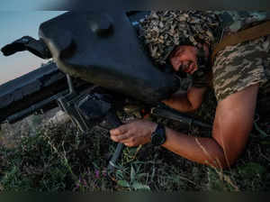 Ukrainian service members attend military drills near a frontline in Donetsk region