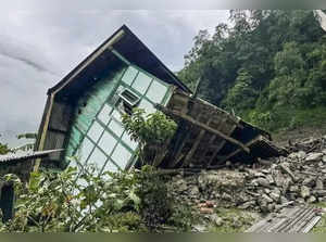 North Sikkim: A house damaged due to landslides triggered by incessant rainfall,...
