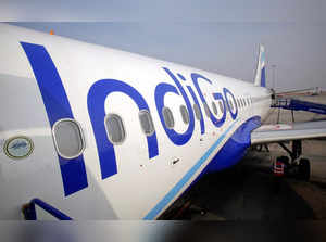 FILE PHOTO: FILE PHOTO: The side of an IndiGo Airlines A320 aircraft is pictured on the tarmac at Bengaluru International Airport in Bangalore