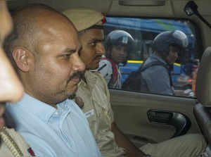 New Delhi: Delhi Police personnel with Chief Minister Arvind Kejriwal’s aide Bib...