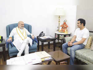 Union Home Minister Amit Shah with former cricketer Gautam Gambhir during a meeting.