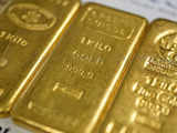 Gold slips as investors await clues on US rate cuts