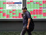 Japan's Nikkei ends firmer as investors buy shares after sharp drop