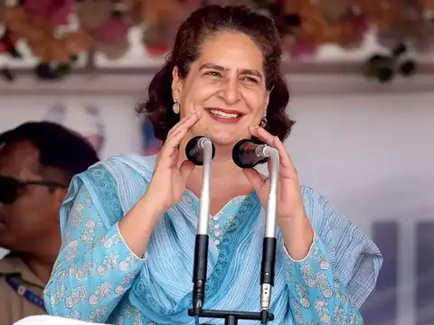 Comparison with Indira Gandhi and political contributions