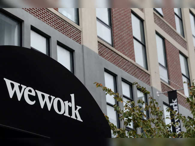 FILE PHOTO: A WeWork logo is seen outside its offices in the Queens borough of New York City