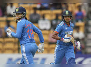 Bengaluru: Indian batters Smriti Mandhana and Harmanpreet Kaur run between the w...