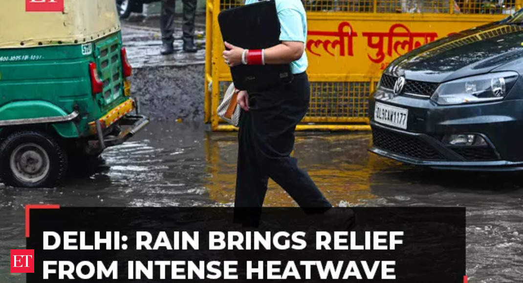 Delhi rains: Light downpour lashes parts of national capital, brings relief from intense heatwave - The Economic Times Video | ET Now