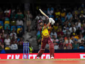 West Indies' Shai Hope hits a six leading to his team's victory in the ICC men's Twenty20 World Cup 2024 Super Eight cricket match between USA and West Indies at Kensington Oval in Bridgetown, Barbados on June 21, 2024.