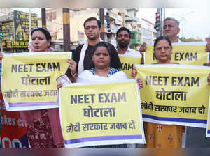 Gurugram: Aam Aadmi Party (AAP) workers hold protest against NEET Exam irregular...