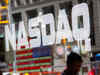 Nasdaq ends higher on tech strength; Dow pulls back