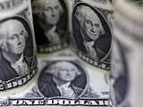 Dollar hits 38-year high vs yen; stocks mixed