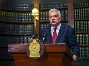 This handout photograph taken on June 26, 2024 and released by Sri Lanka's President Office shows President Ranil Wickremesinghe addressing the nation at the President's Office in Colombo.
