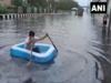 Delhi rain: Traffic crawls, people wade through waterlogged areas; BJP councillor rows in protest