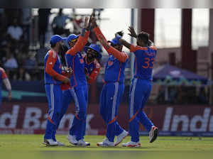Indian players celebrate during the ICC Men's T20 World Cup second semifinal cri...