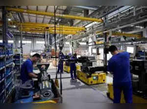 China's June factory activity contracts again, services slows.