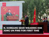 N. Koreans wear Kim Jong Un pins for first time as personality cult grows, AP explains