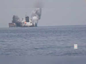 Smoke rises after an explosion on a ship that Houthis say is an attack by them on Greek-owned MV Tutor in the Red Sea