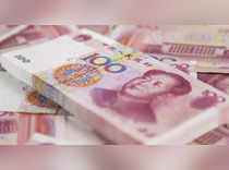China's yuan slumps to seven-month low on weaker guidance