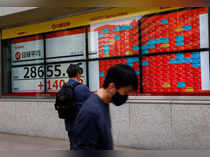 China stocks fall on economic data; HK jumps