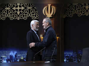 Iran holds runoff presidential vote pitting hard-line former negotiator against reformist lawmaker