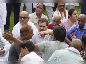 Congress leader Rahul Gandhi with families of the victims of Hathras stampede