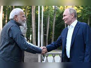 FILE PHOTO: Russia's President Putin and India's Prime Minister Modi meet near Moscow