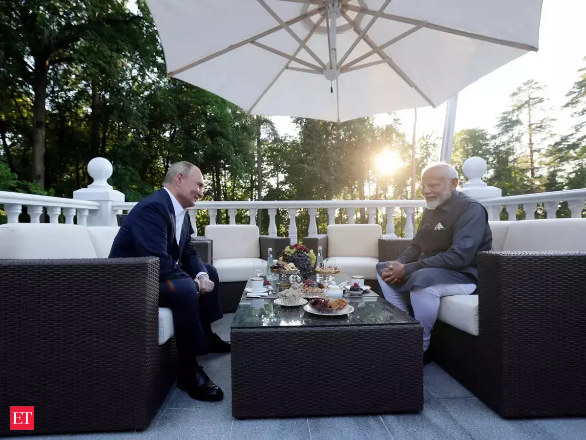 Informal walk - Modi-Putin meet in Russia: Tea, talks, and golf cart ...