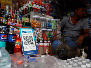 A QR code display of the digital payment app Paytm is seen at a shop in Kolkata