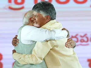 Modi congratulates Naidu Garu on becoming Andhra CM; Chandrababu Naidu thanks "august presence" of PM