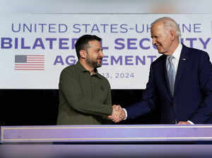 FILE PHOTO: US President Joe Biden with Ukraine's Zelenskiy in Italy
