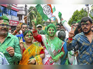 Nadia: Supporters of Trinamool Congress (TMC) candidate from Ranaghat South Asse...