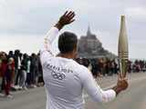 France's Bastille Day parade meets the Olympic torch relay in an exceptional year