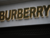 Burberry axes CEO and dividend, warns on profit