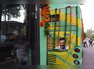 Delhi Chief Minister Arvind Kejriwal's image seen on a Mohalla bus during its trial run.