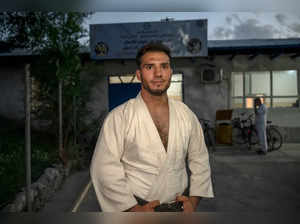 In this photograph taken on June 27, 2024, Afghan judo fighter Mohammad Samim Faizad poses for photos after a training session at the Afghanistan Judo Federation in Kabul, ahead of his participation in the Paris 2024 Olympic Games.