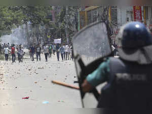 Bangladesh enforces a curfew after days of deadly student protests over government jobs quota