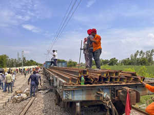 Gonda: Workers during repair work on a railway track after the Chandigarh-Dibrug...