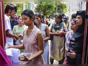 Kochi: Candidates arrive to appear for the NEET (UG) 2024 exam at an examination...