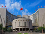 China's central bank cuts short-term policy rate to support economy