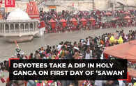 Devotees take a dip in holy Ganga on first day of ‘Sawan’; visuals from across India