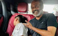 Rajinikanth escorts unwilling grandson to school, pictures go viral