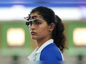 India's Manu Bhaker reacts during the 10m air pistol women's qualification round...