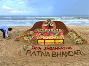 Puri: Renowned sand artist Sudarsan Pattnaik creates a sand sculpture displaying...