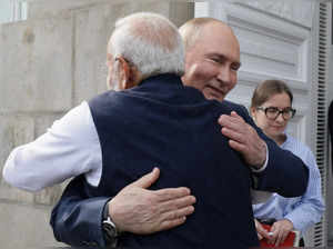 FILE PHOTO: FILE PHOTO: FILE PHOTO: Russia's President Vladimir Putin meets with India's Prime Minister Narendra Modi in Moscow