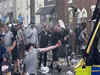 Violent crowd clashes with UK police after young girls killed
