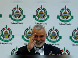 FILE PHOTO: Hamas Chief Ismail Haniyeh gestures during a meeting with members of international media at his office in Gaza City